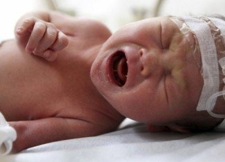 The newborn baby boy rescued from a toilet pipe in China has been released from hospital
