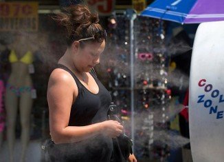 Dozens of people across western US have been treated for exhaustion and dehydration, as the region is continuing to bake in a heat wave
