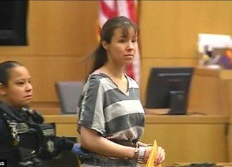 Jodi Arias tries the prison stripes and shackles look instead of her skirts and blouses in court appearance