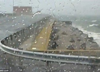 Kent Holcomb was left stranded on the Chesapeake Bay Bridge-Tunnel in Virginia after harsh thunderstorms forced the closure of the bridge