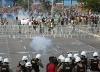 Police have used tear gas to stop protesters from approaching a football stadium during a Brazil-Uruguay Confederations Cup match