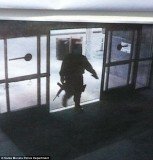 Surveillance footage shows Santa Monica College shooter John Zawahri, entering the campus library, clearly carrying a large firearm