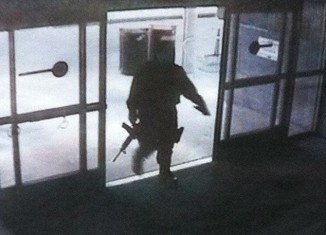Surveillance footage shows Santa Monica College shooter John Zawahri, entering the campus library, clearly carrying a large firearm