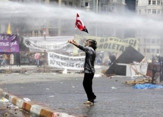 Turkish police clashed with protesters in Istanbul's Taksim Square, despite a warning from PM Recep Tayyip Erdogan