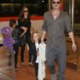 Angelina Jolie and Brad Pitt arrive in Tokyo with their children