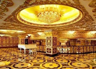 Chinese state-owned drug company building decorated to mimic France's Versailles palace, complete with gold-tinted walls and chandeliers