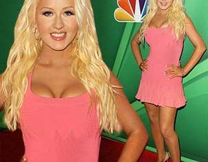 Christina Aguilera silenced last year's fat-shaming critics by showcasing her 20 lbs weight loss in a pink mini-dress at a NBC press event in Beverly Hills