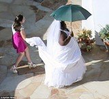 Gabourey Sidibe pranks Jimmy Kimmel as she arrives to his wedding wearing a white dress and veil