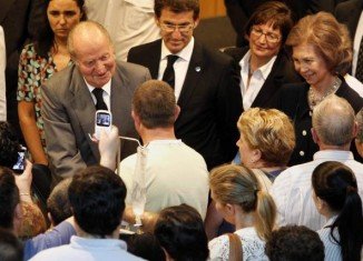 King Juan Carlos of Spain on a visit to the dozens of hospitalized survivors in Santiago de Compostela
