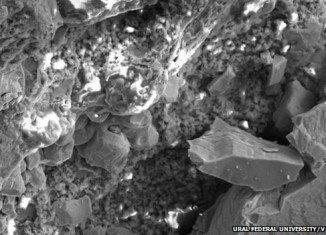 Russian scientists have released microscopic images of fragments of the meteorite that hit the central city of Chelyabinsk in February