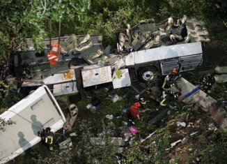 The coach hit several vehicles before smashing through a parapet and toppling down a steep slope near the town of Avellino
