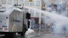 Turkish riot police have fired tear gas and water cannon at protesters trying to enter Istanbul’s Gezi Park