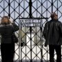 Angela Merkel becomes first German chancellor to visit Dachau camp