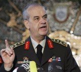 General Ilker Basbug, Turkey's former armed forces chief, has been jailed for life for plotting to overthrow the government
