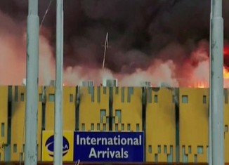 International flights have begun landing at Nairobi's international airport a day after fire gutted the arrivals hall
