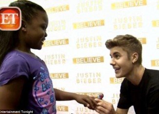 Justin Bieber broke the Make-A-Wish Foundation record by granting its 200th wish after spending time with sick 8-year-old fan Annalysha Brown-Rafanan and accepting her marriage proposal