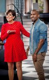 Kanye West proudly shows off a picture of his baby daughter North with Kim Kardashian on Kris Jenner’s show