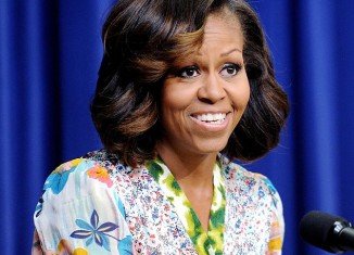 Michelle Obama showed off her brand new look yesterday while speaking at a film screening in Washington, DC