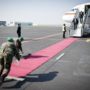 German man dancing on Angela Merkel’s military jet
