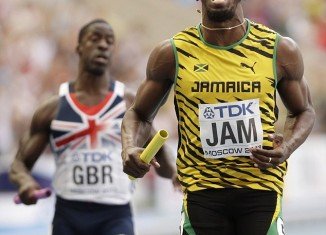 Usain Bolt guided the Jamaican team to victory in the sprint relay in Moscow to become the most successful athlete in the history of the World Championships