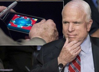 A Washington Post photographer snapped an over-the-shoulder picture of John McCain casually betting play money on his electronic cards, while Syria's fate was the subject of passionate statements and often carefully manicured rhetoric