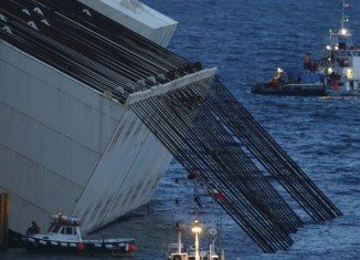 Costa Concordia has been freed from rocks, 20 months after it ran aground