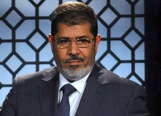 Egypt's state prosecutor announces he has referred ousted President Mohamed Morsi for trial on charges of inciting the murder of protesters
