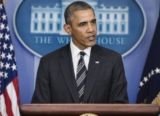 President Barack Obama urged House Republicans to pass the Senate's stopgap budget bill and to extend the debt limit