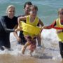 Princess Charlene of Monaco swimming with children in Saint Geours de Maremne