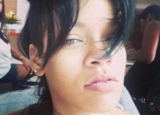 Rihanna posted make-up free selfie on Instagram two days after opening a new cosmetics store in Hong Kong