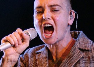 Sinead O'Connor displayed the initials “B” and “Q” on her cheeks while onstage at Bestival music festival