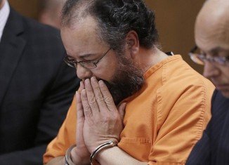Two corrections officers who were in charge of watching Ariel Castro in prison were put on paid leave following his suicide