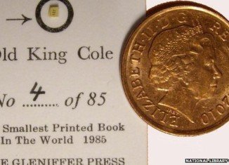 World’s smallest printed book, no bigger than a grain of rice, is part of a new exhibition of miniature books at the National Library of Scotland in Edinburgh