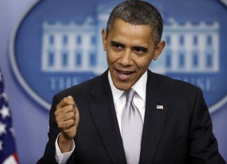 Barack Obama has announced he is willing to sign a "clean" short-term increase to the US borrowing limit that is free from Republican budget and policy demands
