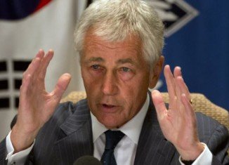 Chuck Hagel has announced that most of the 400,000 US defense department staff sent home amid the US government shutdown have been told to return to work next week