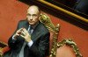 Enrico Letta has won a confidence vote after a last-minute U-turn by former PM Silvio Berlusconi