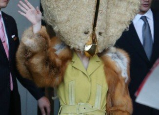 Lady Gaga wearing a furry cheese mask in Berlin