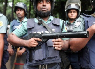 Three people were killed and dozens injured in Bangladesh Friday when security officials clashed with opposition supporters trying to defy a ban on protests, in Dhaka