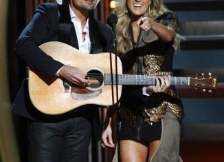 CMA Awards host Brad Paisley and his co-host Carrie Underwood mocked ObamaCare