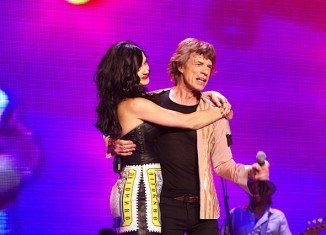 Mick Jagger has denied Katy Perry's claims that he made a pass at her when she was 18