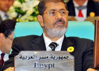 Mohamed Morsi and 14 other Muslim Brotherhood figures face charges of inciting the killing of protesters in clashes outside the presidential palace