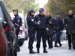 Paris authorities have launched a manhunt after a gunman attacked offices of the newspaper Liberation and fired outside the HQ of the bank Societe Generale