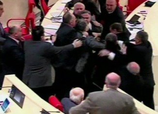 A fight between majority and opposition erupted in the Georgian parliament over plans to support the Ukrainian opposition for European integration