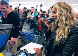 Beyonce surprised supermarket shoppers in Massachusetts when she paid an unexpected visit to a Wal-Mart in Tewksbury