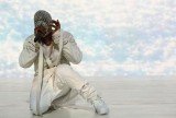Kanye West halted his show in Phoenix to share his disappointment with fans after his album Yeezus failed to grab a nod in Grammys 2014 Album of the Year nominations