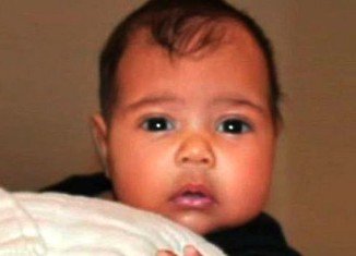 Kim Kardashian’s 5-month-old daughter North West tried out swimming for the first time