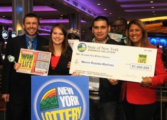 New York Lottery officials cut Marvin Martinez a check for the winning ticket he found raking leaves last November in the wake of Superstorm Sandy