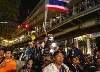 Thai anti-government protesters have surrounded the stadium where candidates were due to register to stand in February's elections