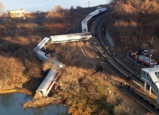 The Metro-North train from Poughkeepsie to Grand Central Station derailed as it went into a bend in the railway line near Spuyten Duyvil station