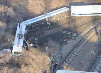 The Metro-North train's locomotive and carriages derailed as the train went into a bend in the railway line near Spuyten Duyvil station